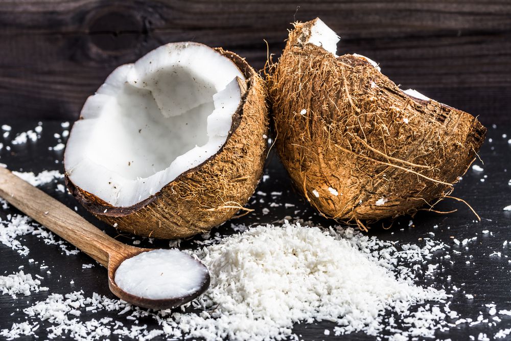 fresh-coconut-and-coconut-oil-on-wooden-spoon