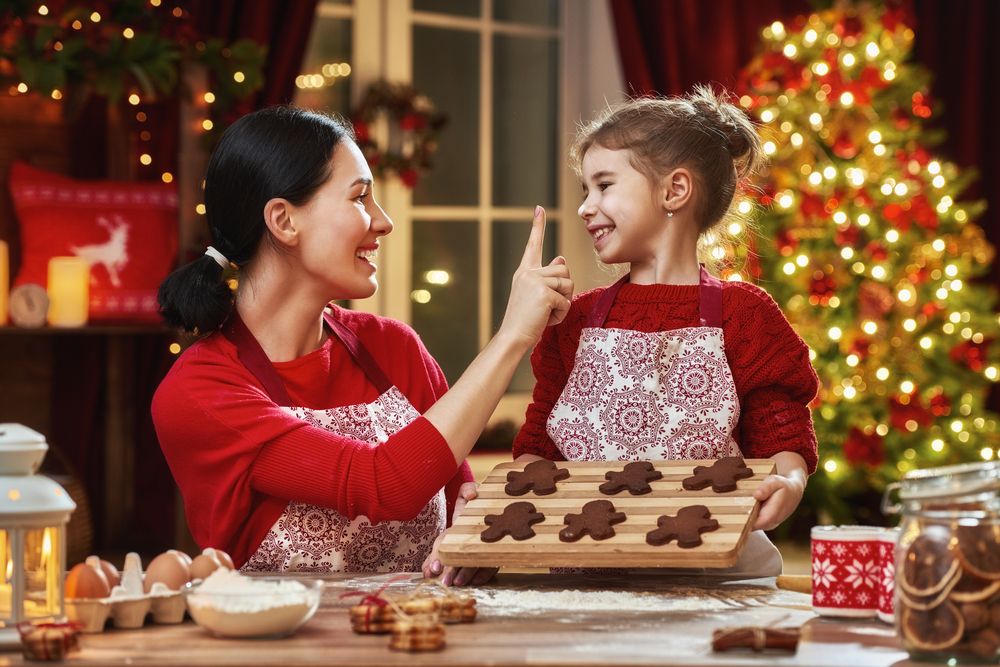 merry-christmas-and-happy-holidays-family-preparation-holiday-food-mother-and-daughter-cooking-christmas-cookies